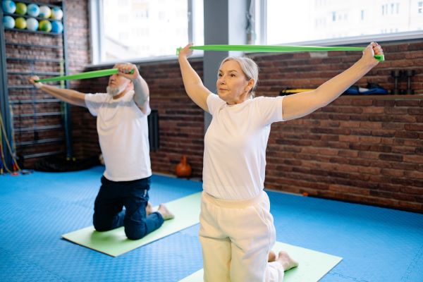 couple doing strength exercise for prevention of osteoporosis